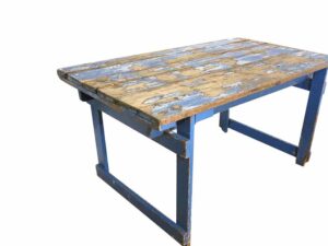 worn blue painted wooden Trestle table